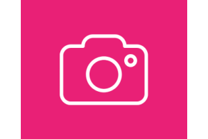 White camera icon on vibrant pink background