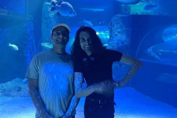 Better Health Network client and support worker at Melbourne Aquarium